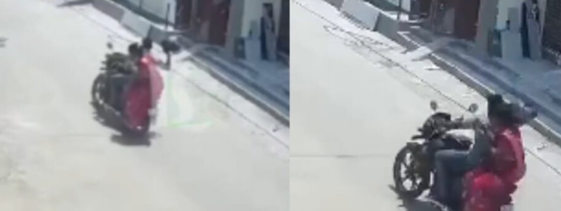 ബൈക്ക് ഓടിക്കുന്നതിനിടെ പുറകിലിരുന്ന  അമ്മായിയമ്മയെ ഹെൽമറ്റിന് അടിച്ച് നിലത്തിട്ട് മരുമകൻ : ദാരുണാന്ത്യം